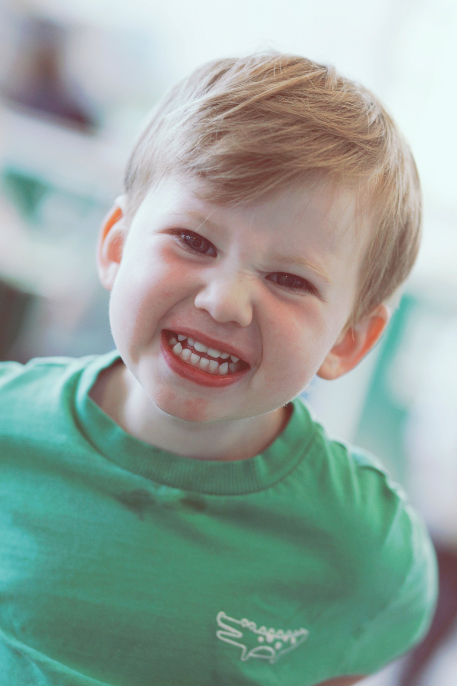 Joyful nursery child with natural smile