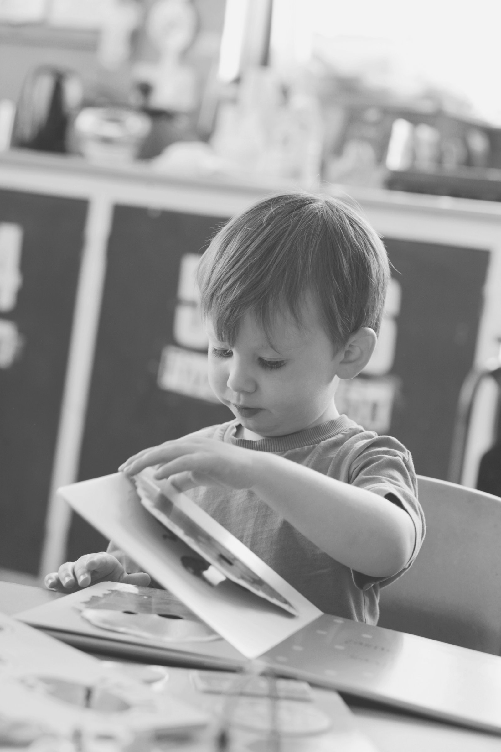 Joyful nursery child reading